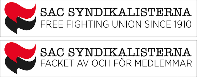 Svarta-röda fanor. Texten SAC Syndikalisterna och annan text som hör till en variant av SAC:s logotyp.